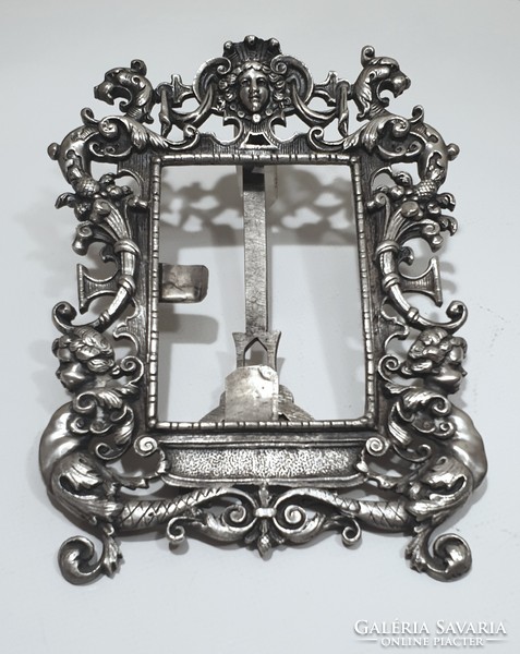 Ezüstözött réz képkeret , kerub díszítésekkel XIX század végéről