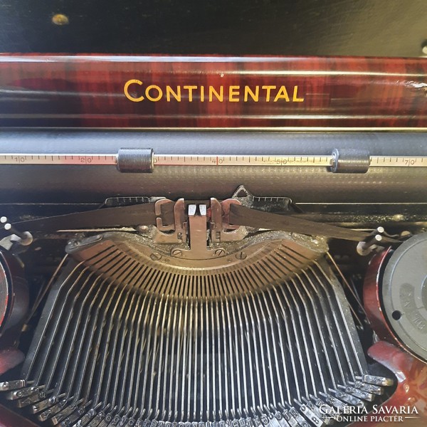 Antique burgundy-gold continental 340 typewriter with original box and cleaning brush