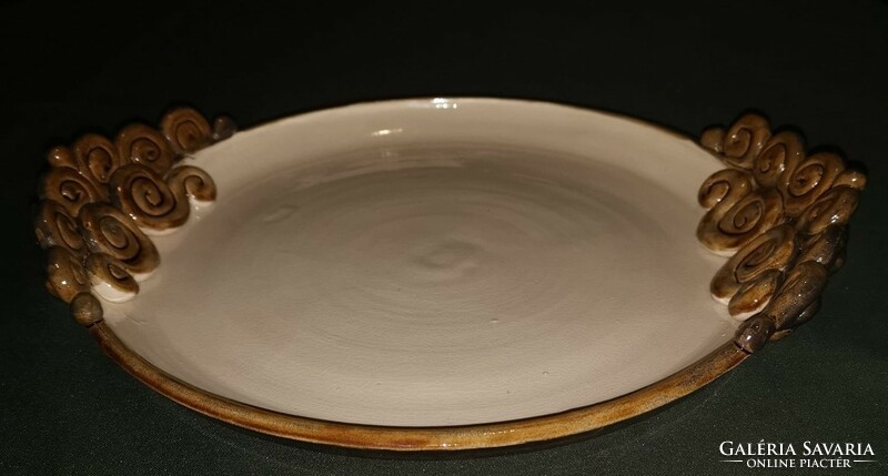 Brown beige glazed ceramic serving-baking bowl with twisted handle