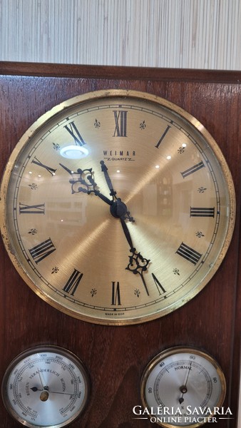 Weimar quartz East German wall clock with barometer and hygrometer.