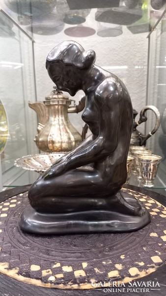 Antique nude ceramic statue