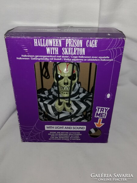 Halloween skeleton in prison with sound and light effects in a box