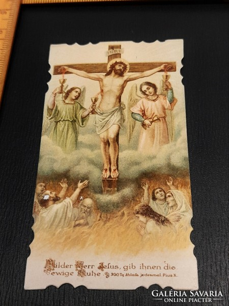 Holy image in an antique prayer book, prayer sheet