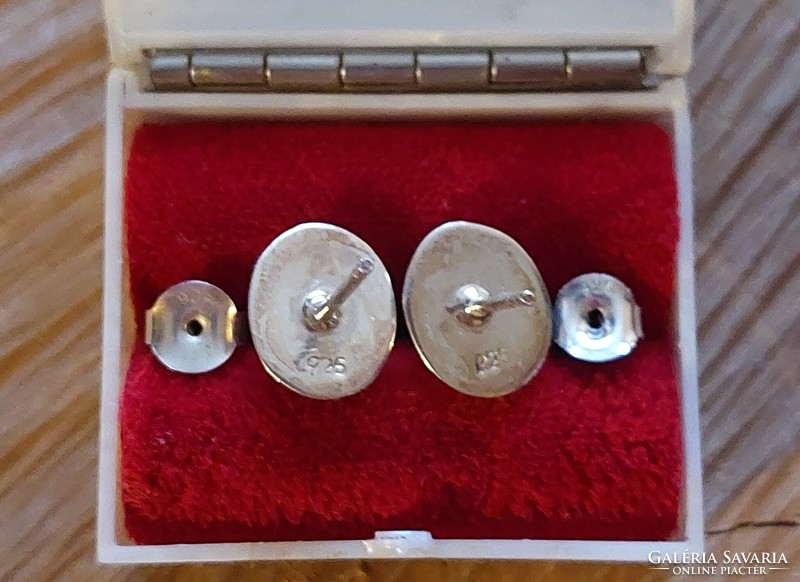 Beautiful silver earrings, spiral