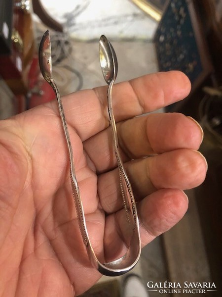 Silver sugar tongs, xix. Century, 15 cm piece.