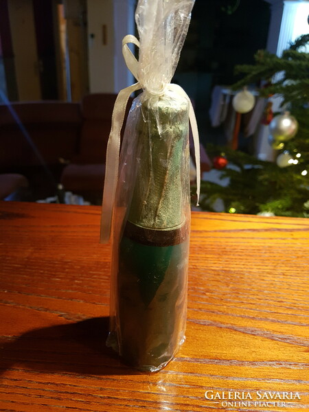 Candle in the shape of a wine bottle