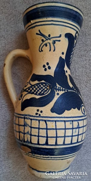 Antique ethnographic mug with blue pattern