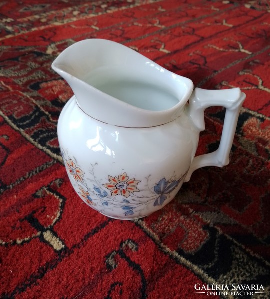 Antique old Czech porcelain milk spout with a handle, a small jug with a hand-painted delicate flower pattern