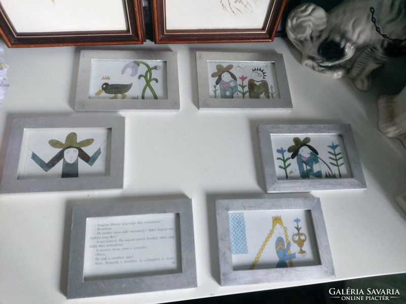 6 charming, fairytale-themed pictures in a silver-painted wooden frame (18 × 13 cm)