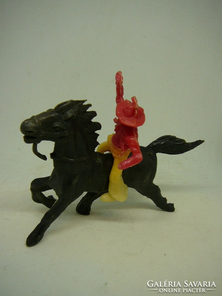 Traffic-carrying, plastic cowboy with a horse from the 1970s and 1980s