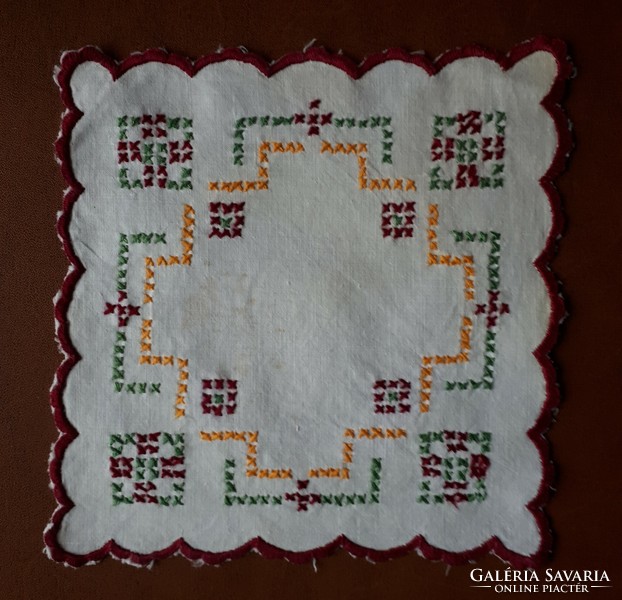 Small embroidered cross-stitch tablecloth
