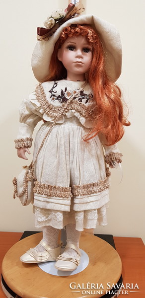 Beautiful red long-haired porcelain doll