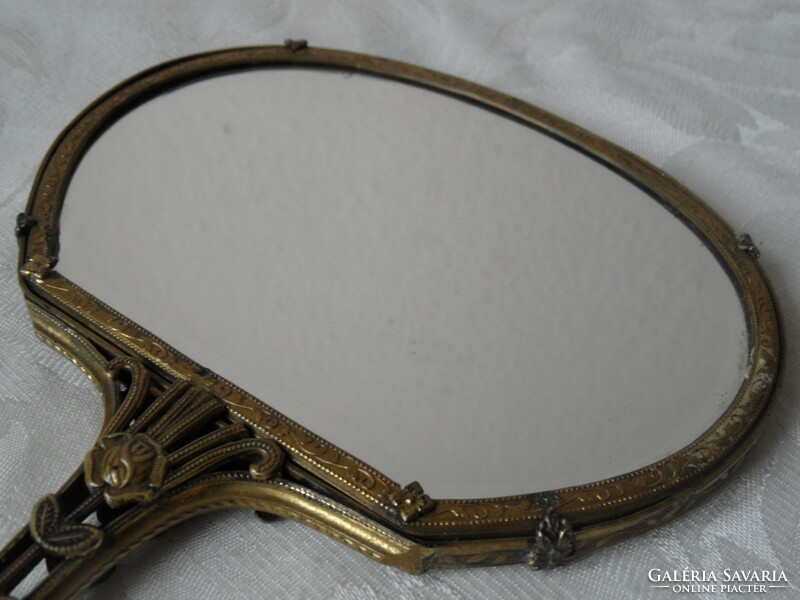 Antique old copper hand mirror