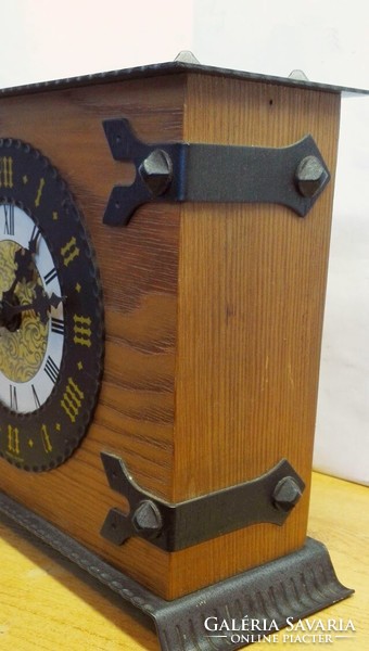 Iron-on quartz, rustic style table clock in natural pine house, functional