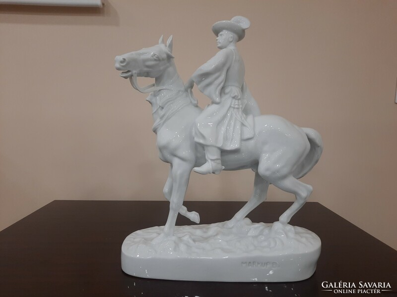 White Herend mounted hussar, porcelain figure on foal horse