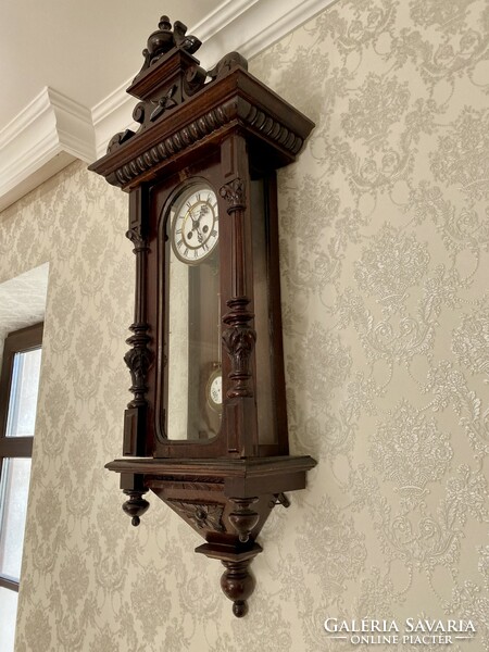 Pewter carved wall clock with spring movement