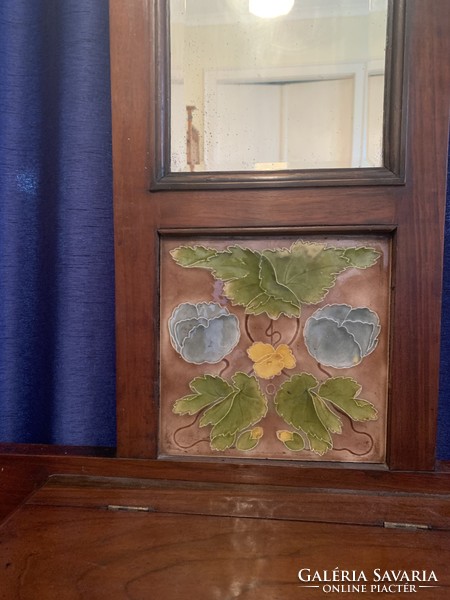 Antique mirror hall wall with tile inlay