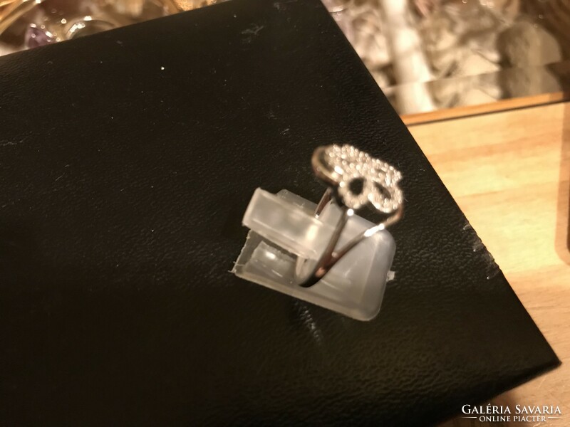 Silver ring with small diamonds