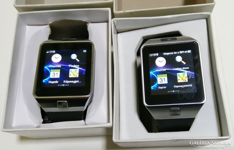 2 smart watches for sale, smart watches with sim and memory cards! With charging cables, (like new) + 1 battery!