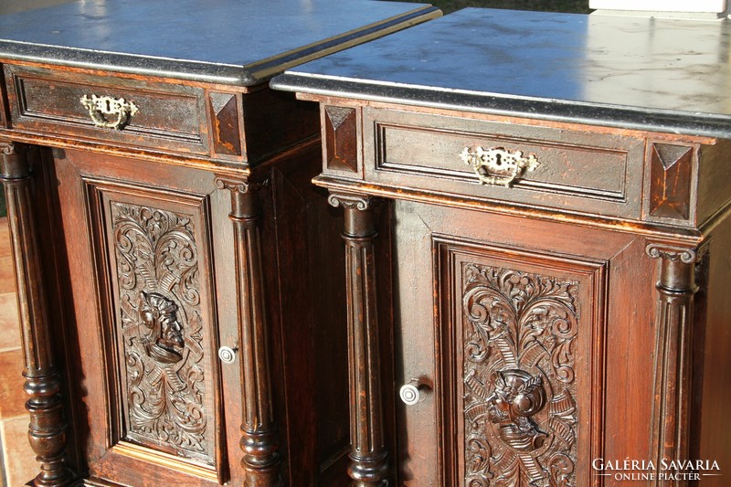 A pair of German pewter, marble-top, carved bedside tables, left-right
