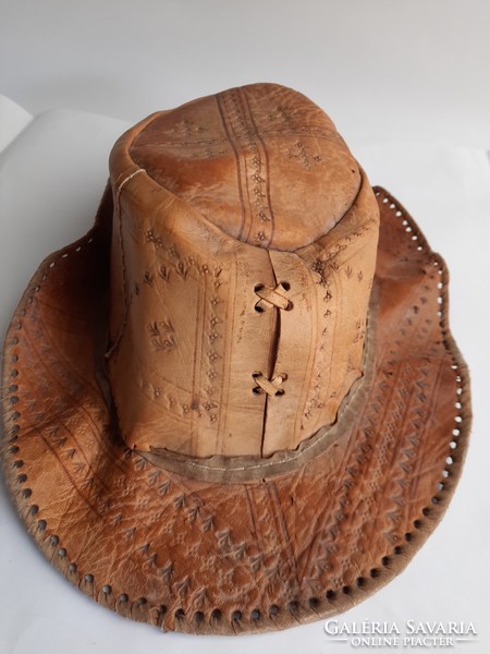 Old split leather hat - with a small sewing defect