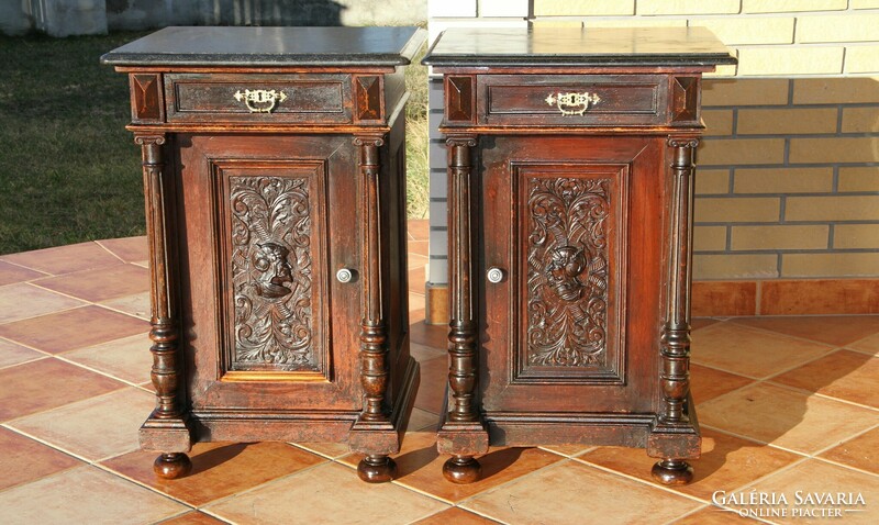 A pair of German pewter, marble-top, carved bedside tables, left-right