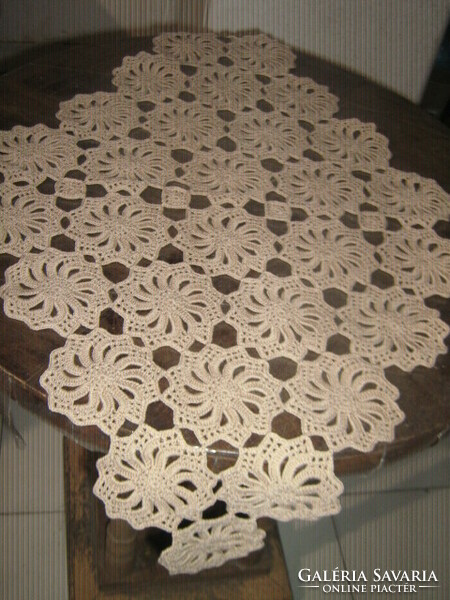 Beautiful hand-crocheted boat-shaped floral lace tablecloth