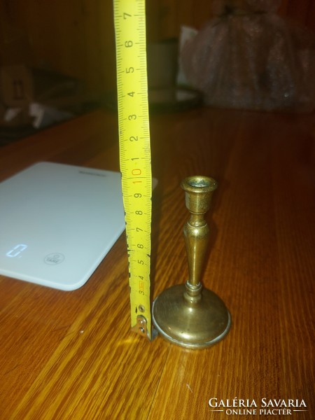 Small, antique copper candle holder