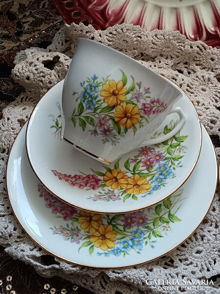A breakfast set that almost comes to life with the flowers of a spring field
