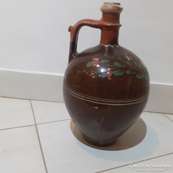 Old folk earthenware jug