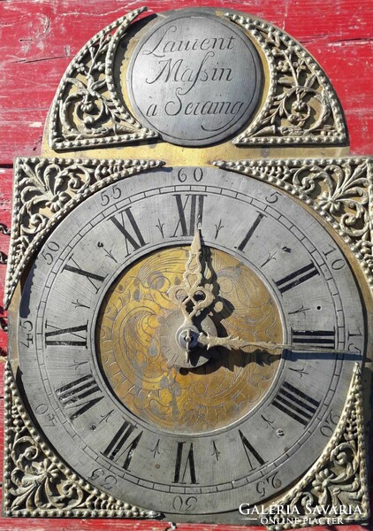 Antique standing clock.