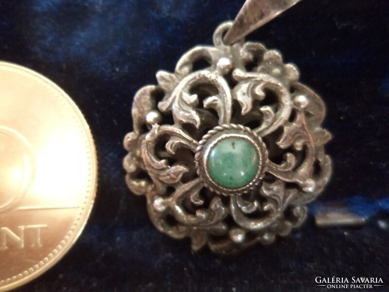 Antique silver openwork pendant with emerald (?) Green stone