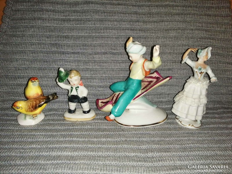 4 defective porcelain figurines in one