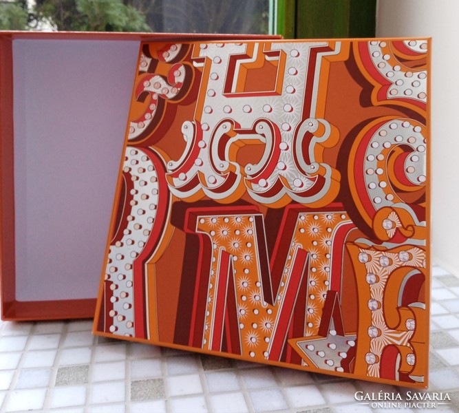 Gift box decorated with Hermes cirque du soleil inspired graphics
