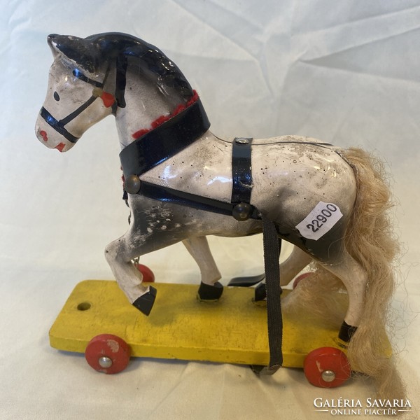 Antique rolling toy rocking horse