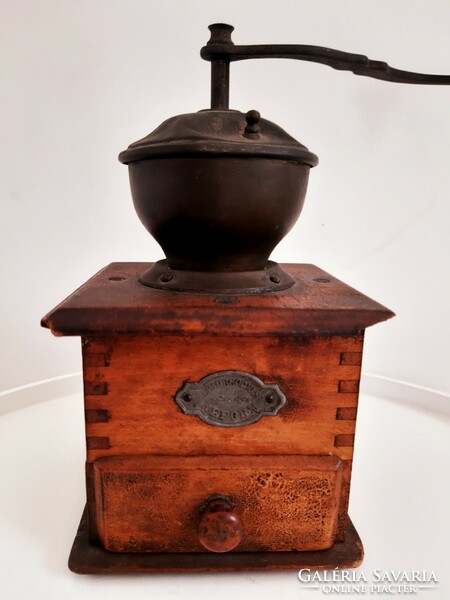 Old wooden reform coffee grinder