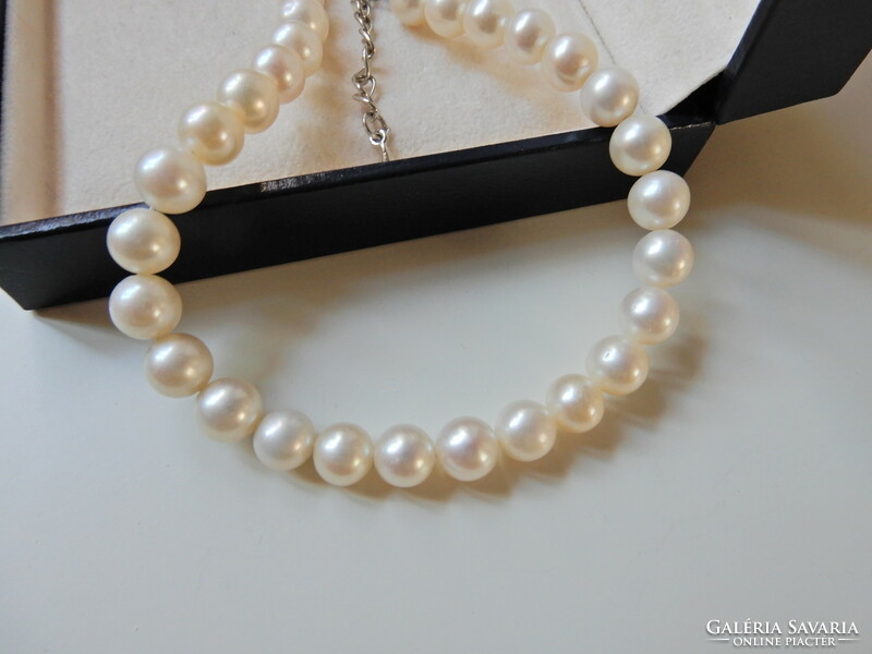 Genuine freshwater pearl string with silver clasp