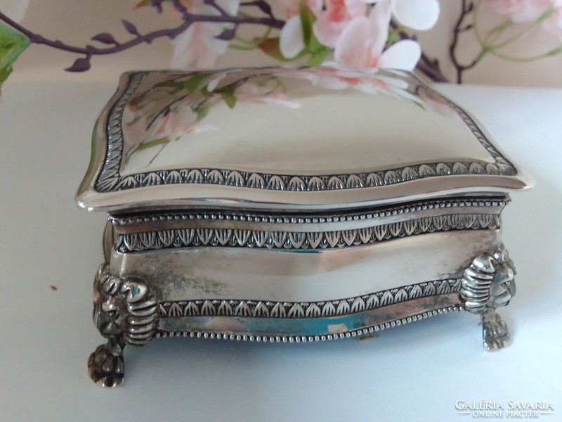 The silver-plated jewelry box is flawless!