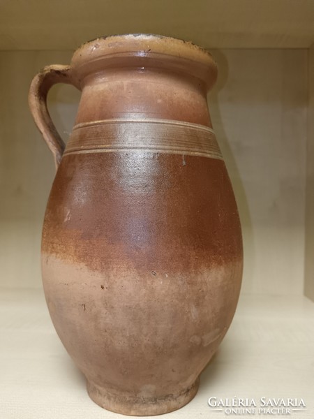 Brown ceramic jug