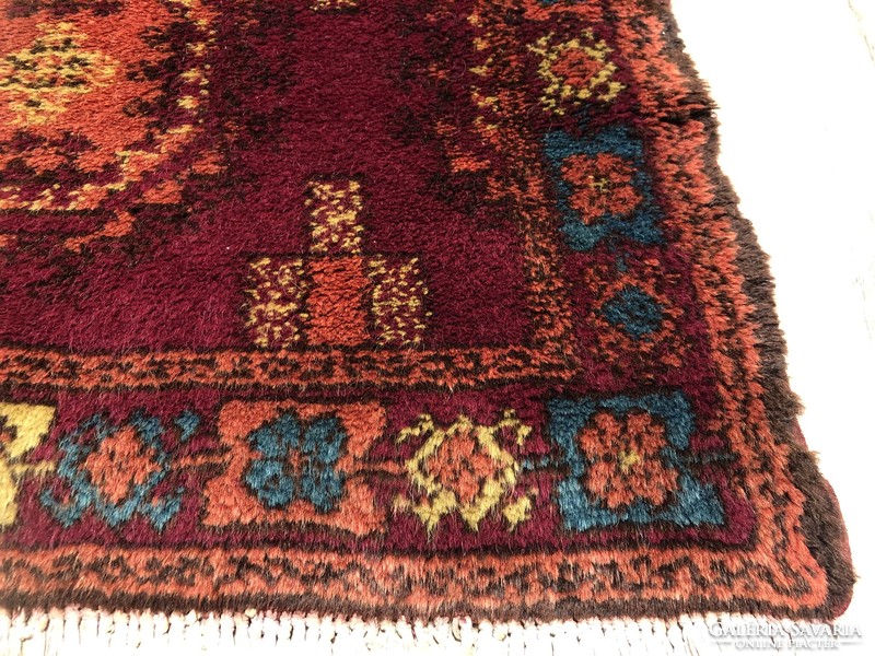 Old hand-knotted woolen Persian rug, 80 x 131 cm