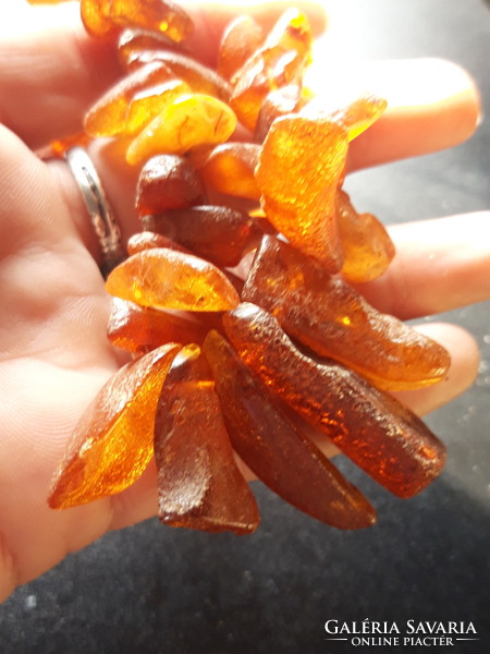Natural, unpolished amber necklace with large eyes