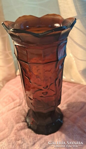 Antique glass vase with an oak leaf pattern.