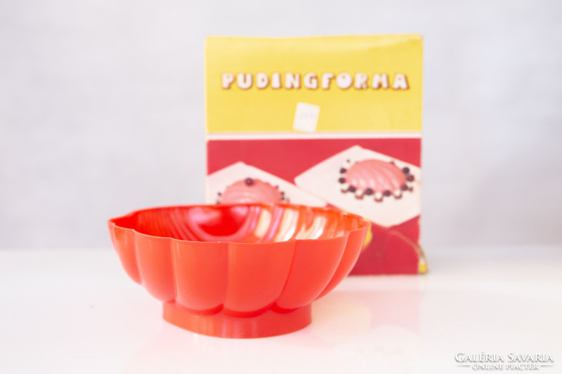 In a retro shell-shaped pudding mold box
