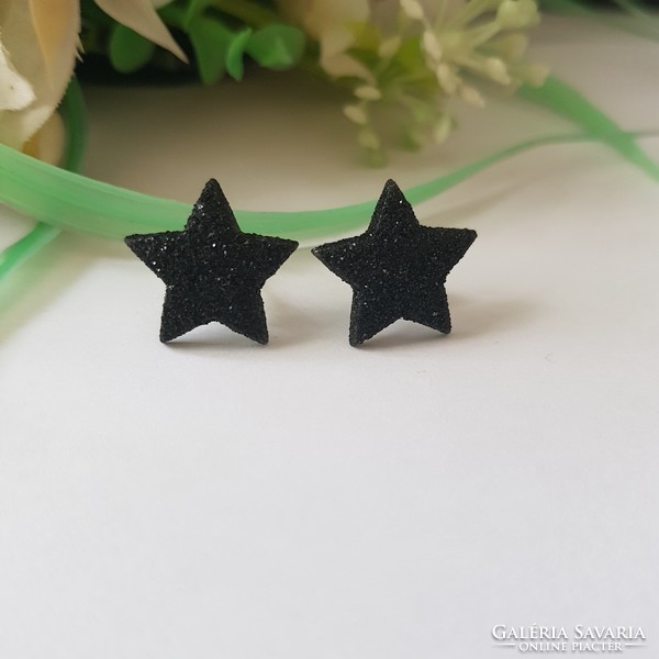 New, shiny black, star-shaped earrings, bijou