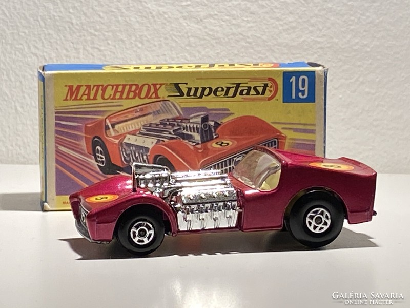 With Matchbox road dragster box