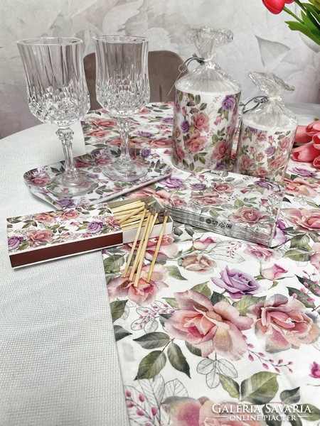 A beautiful table decoration set with a rose pattern