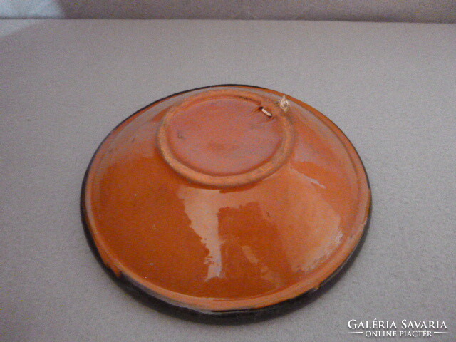 Ceramic wall plate.