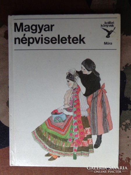 Hungarian folk costumes written by dr. Mária Flórián drew it: erika urai