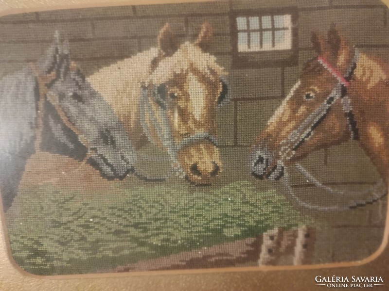 Equestrian tapestry picture in a frame