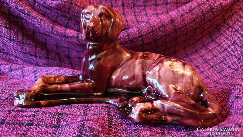 Large old ceramic dog. Injured. 20 cm long.